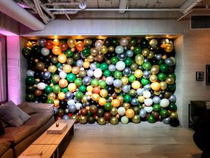 Organic Balloon Wall with Green and White Balloons 1