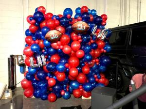 Organic Balloon Wall with Red and White Blue Balloons - Game Night